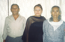 Raquel with her parents